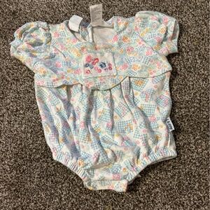 Colorful Baby Romper with Playful Patterns
